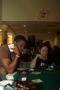 Photograph: [Two students at a table for UNT's Casino Night]