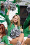 Photograph: [NT Dancer waving on float in UNT Homecoming Parade, 2007]