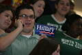 Photograph: [Student on phone in crowd at Chelsea Clinton talk]