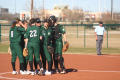 Primary view of [UNT players huddled in pitcher's circle]