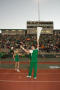 Photograph: [Cheer members leading crowd at Homecoming game, 2007]