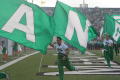 Photograph: [Spirit flag runners during the UNT v Navy game]