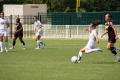 Thumbnail image of item number 1 in: '[Kendall Juett moving to kick the soccer ball]'.