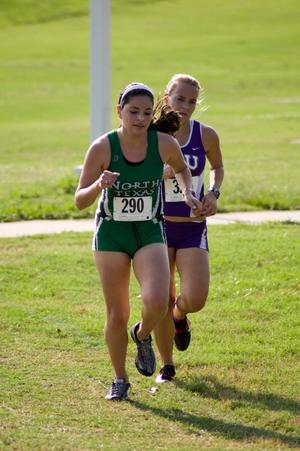 Primary view of object titled '[Runners finishing North Texas Invitational]'.