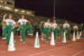 Photograph: [NT Cheer members on track at Homecoming game, 2007]