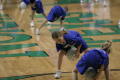 Photograph: [Children dribbling on court during half-time]