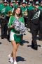 Photograph: [NT Dancer and band in UNT Homecoming Parade, 2007]