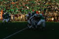 Photograph: [Players struggling at first-down, October 13, 2007]