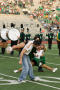 Photograph: [Dancers being spun during UNT vs. Navy game, 2007]