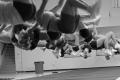 Photograph: [Cheerleaders practicing the back tuck]