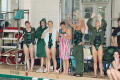 Photograph: [NT swim team cheering from side of pool]