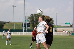 Primary view of object titled '[Danielle Herron headbutting the ball]'.