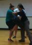 Photograph: [Participants practicing defensive moves]