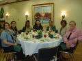 Photograph: [Women seated at a table during 2007 WOC Conference]