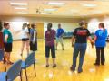 Photograph: [Self-defense participants gathered in practice room]