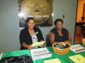 Primary view of [Cheylon Brown at welcome table for Fall Welcome]