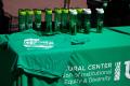 Photograph: [Water bottles and shirts on the Multicultural Center booth]