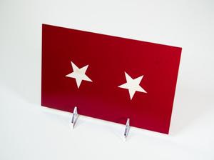 A red rectangle with two white stars on it.