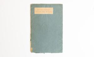 A light blue and worn book cover, the title in the top corner, inside a white box.