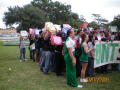 Photograph: [People gathered with a UNT SERVES sign 4]