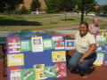 Primary view of [Student at Belize booth during 2005 Carnival]