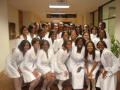 Photograph: [Sorority in white at event]