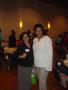 Photograph: [Two women at 2005 Women of Color Conference]