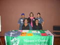 Photograph: [Women's Center table at 2005 Women of Color Conference]