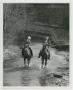 Photograph: [Man, Woman and a Child Riding Horseback]