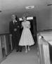 Photograph: [Photograph of a bride walking down the aisle]