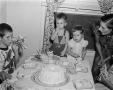 Photograph: [Photograph of Pam and Byrd Williams IV at a table as toddlers]