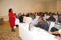 Photograph: [Woman leading workshop at 2012 TABPHE conference]