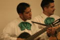Photograph: [Mariachi guitarists at 2004 La Raza ceremony]