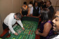 Photograph: [Players at craps table at 2012 TABPHE Conference 2]