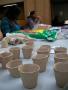 Photograph: [Clay cups at table]