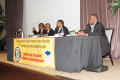 Photograph: [Men on panel at 2012 TABPHE conference]