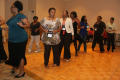 Photograph: [Women lined up to dance at 2012 TABPHE conference 3]