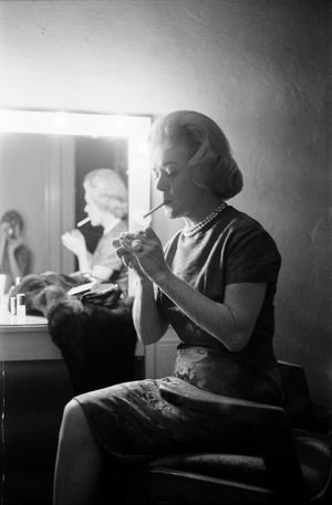 Primary view of object titled '[Alice Faye in a dressing room, 2]'.