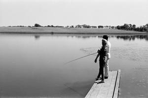 Primary view of object titled '[Alice Faye and Jose Ferrer fishing]'.