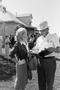 Photograph: [Alice Faye and an unknown man on set]