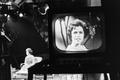 Photograph: [A woman on a television screen, 3]