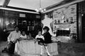 Photograph: [Charley Pride with his family in a living room, 2]