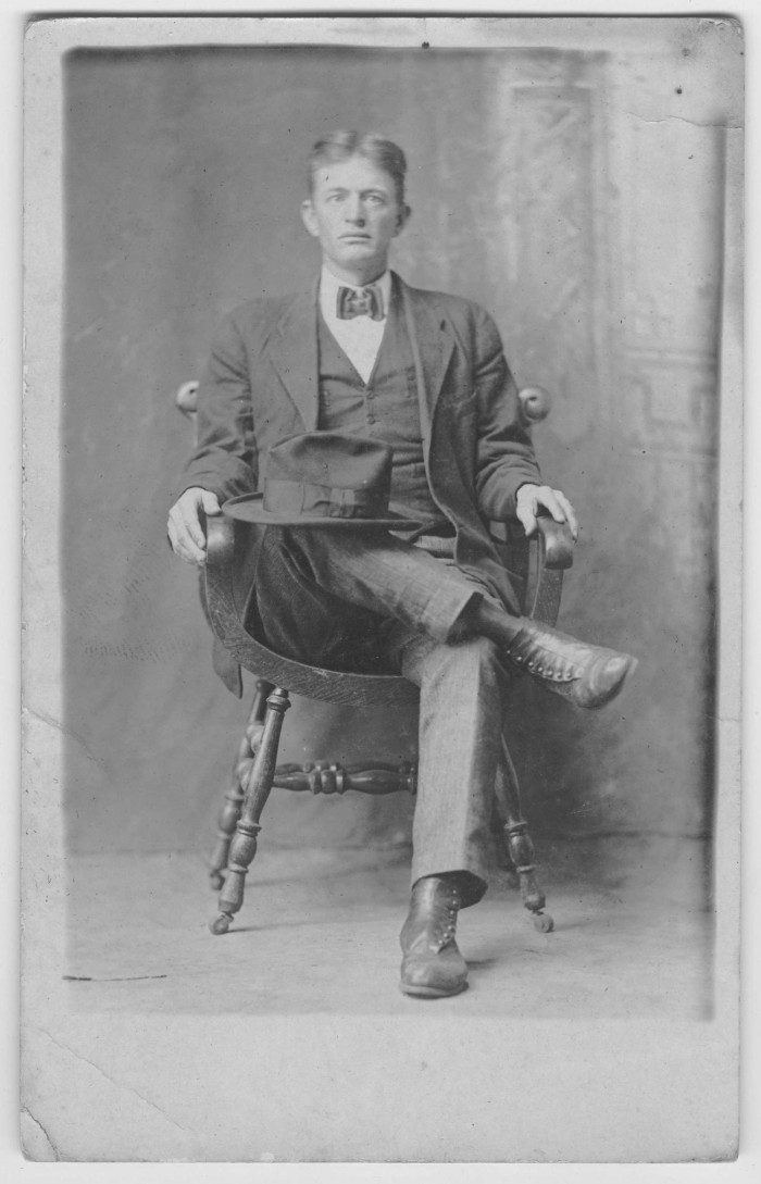 man sitting cross legged