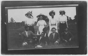 Primary view of object titled '[Four women and four men posing together, 2]'.