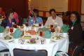 Photograph: [Women around table at Eye on the Prize luncheon]