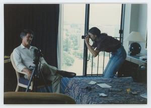 Primary view of object titled '[Tosh Plumlee being photographed]'.