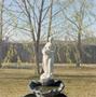 Photograph: [A fountain with a statue]