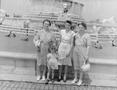 Photograph: [Three women and a little girl in front of a fountain]