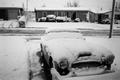 Photograph: [A snow-covered automobile]