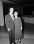 Photograph: [Man and woman in formal attire, posing together, 2]